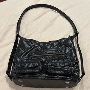 Lug Zipliner Tote.  Inverts from shoulder bag to backpack.